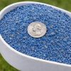 Cutrine Plus Granular algaecide blue granules in a scoop, 2–6 mm particle size