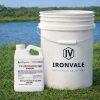 Alligare Flumigard SC Half Gallon Herbicide next to 5 gallon container for size reference.