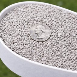 Gray 5/8ths mesh granules in scoop