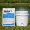 Sculpin G Granular Herbicide 40 lb bag next to a 5 gallon bucket by a pond