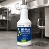NewTechBio NT-MAX 32 fl oz drain and grease trap treatment bottle beside a commercial kitchen floor drain.
