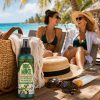 BugMace natural mosquito and insect repellent spray in a beach tote beside lounge chairs during a tropical vacation